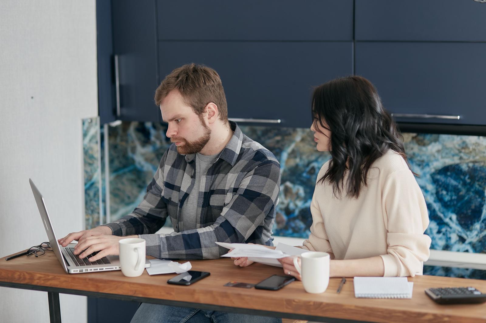 A professional examining verified customer ROI data and milestone performance graphs.